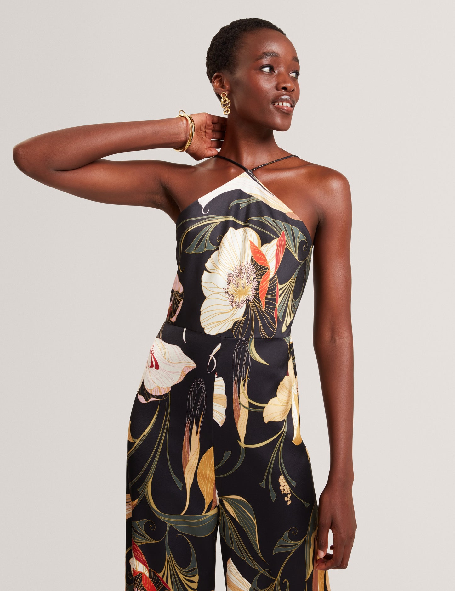 VEHRA: Printed Halter Neck Jumpsuit