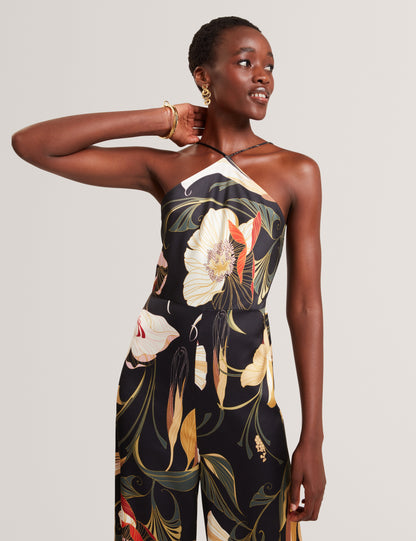 VEHRA: Printed Halter Neck Jumpsuit