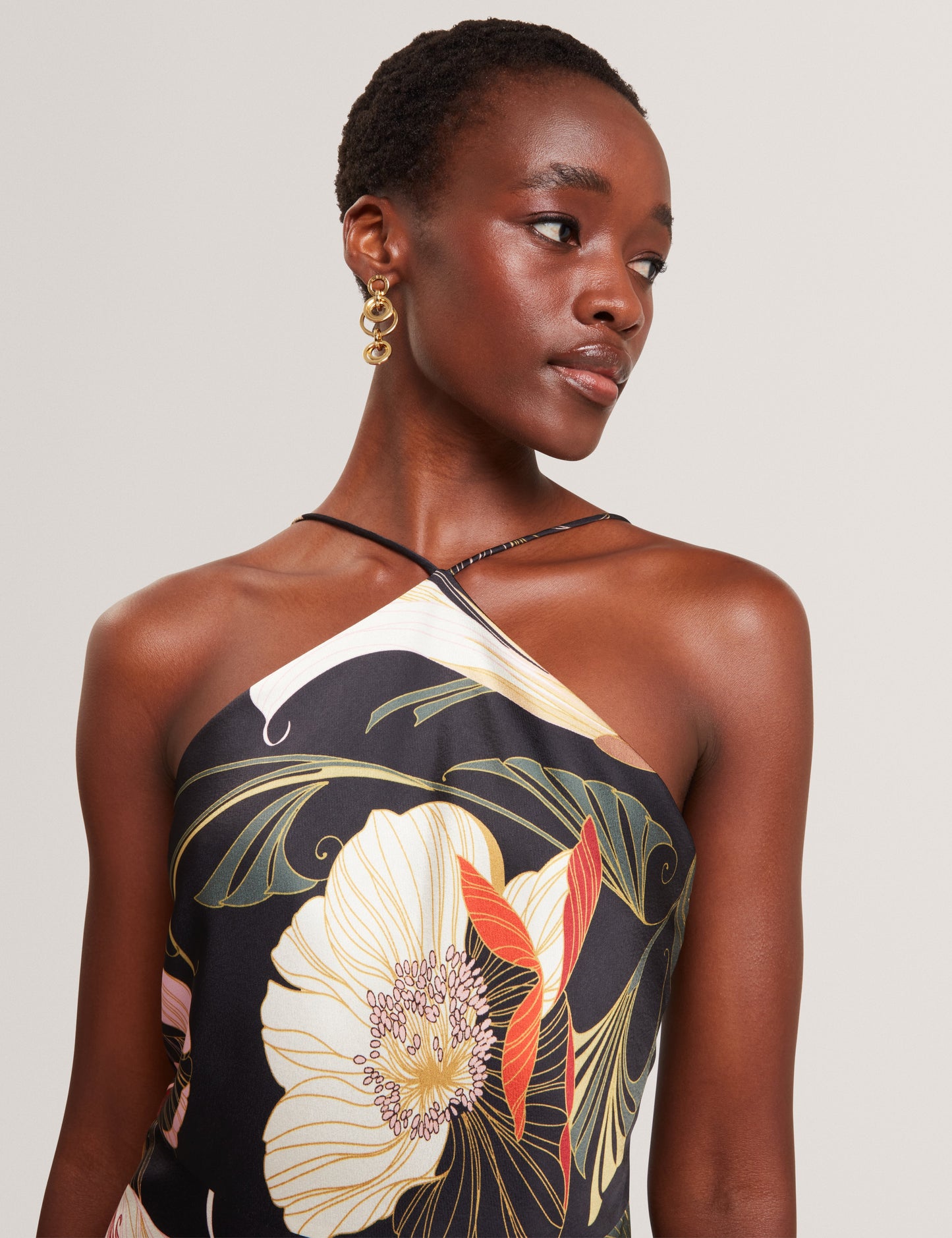 VEHRA: Printed Halter Neck Jumpsuit