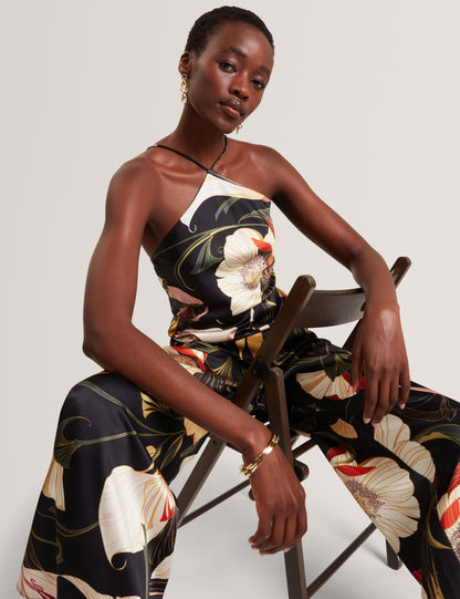 VEHRA: Printed Halter Neck Jumpsuit