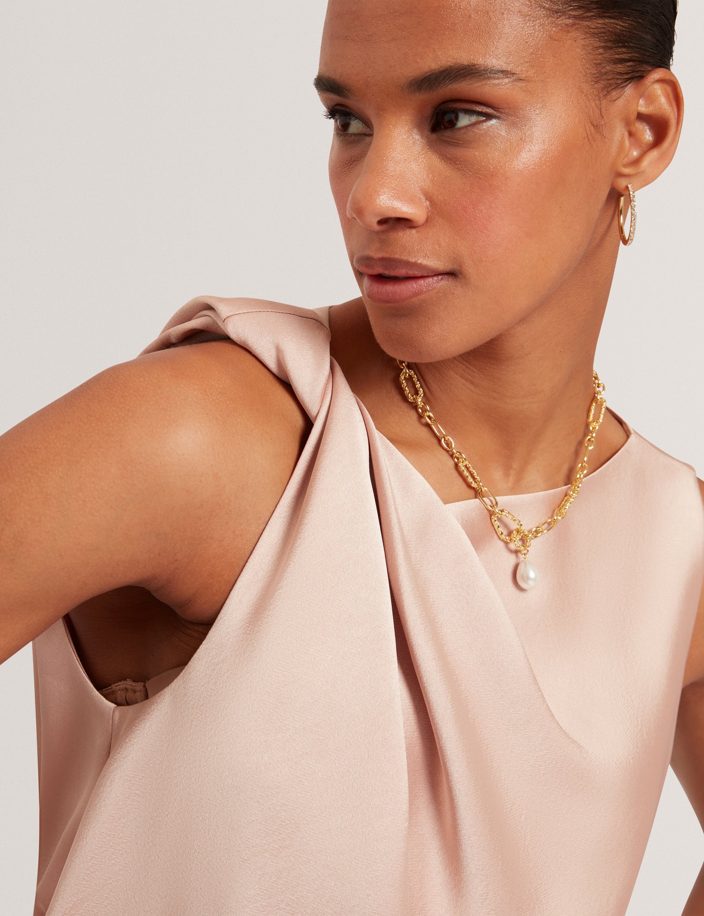 MIONA: Sleveless Twist Detail Top