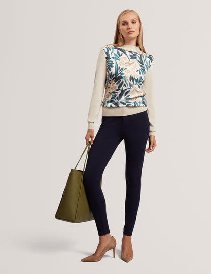 MERRNI: Printed Woven Front Knit Top