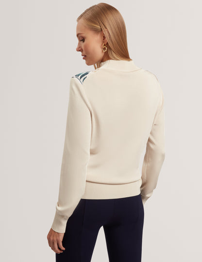 MERRNI: Printed Woven Front Knit Top